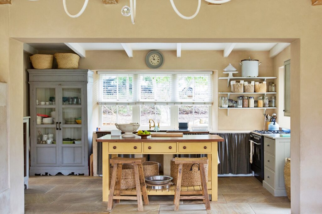 French country kitchen with vintage cabinets and island