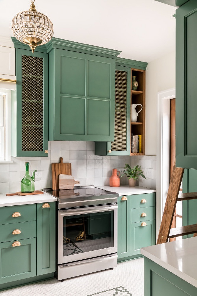 Renovated kitchen with green cabinets