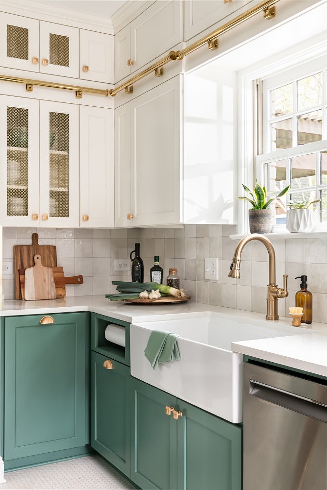 Green and white kitchen with farmhouse sink
