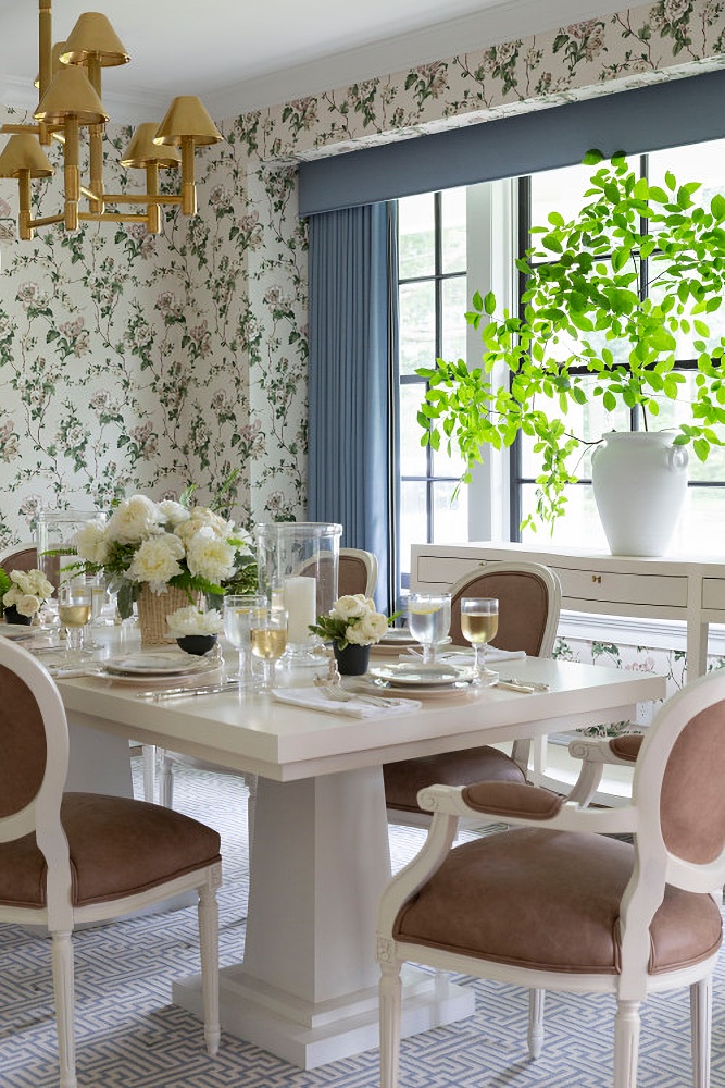 Traditional dining room with floral wallpaper