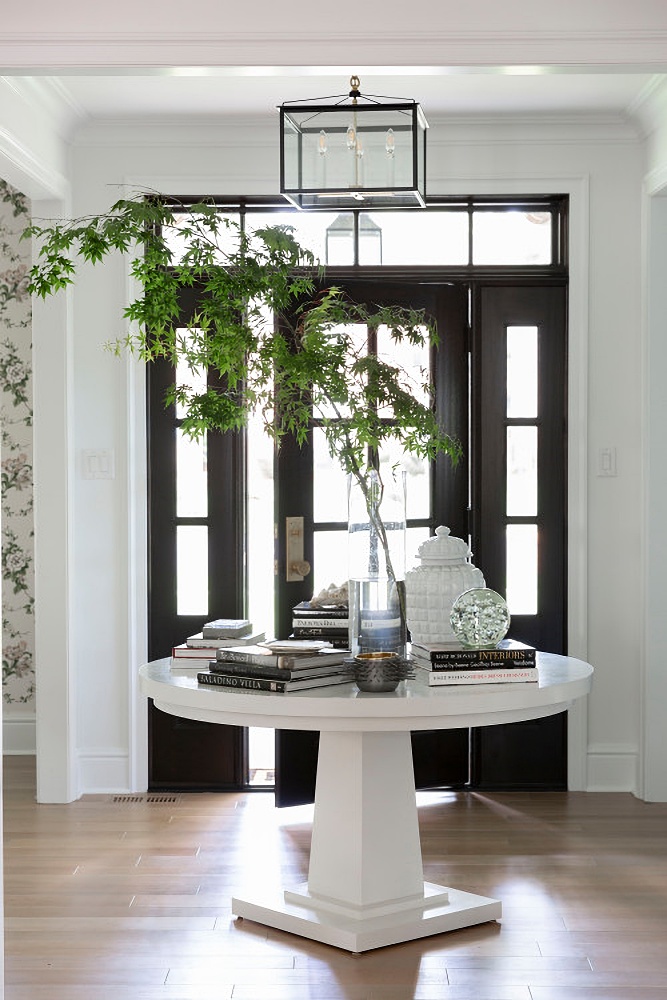 Traditional entryway with round table