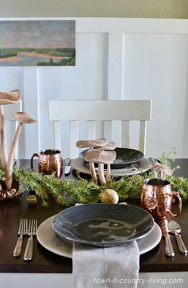 Earthy tablescape with wood mushrooms