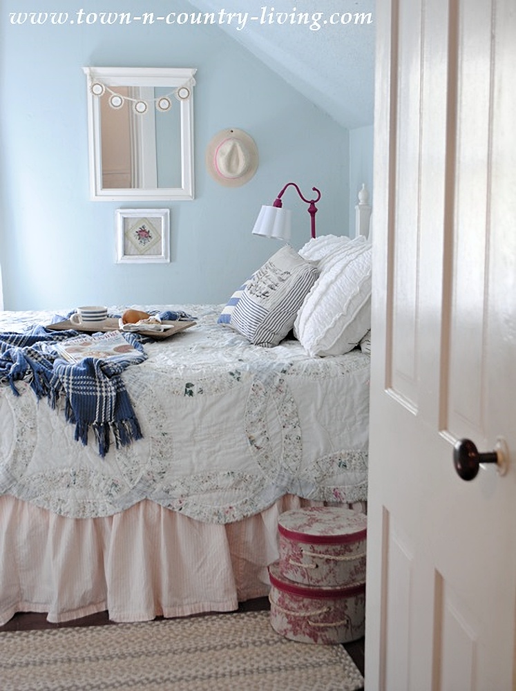 Cottagecore style bedroom with patchwork quilt