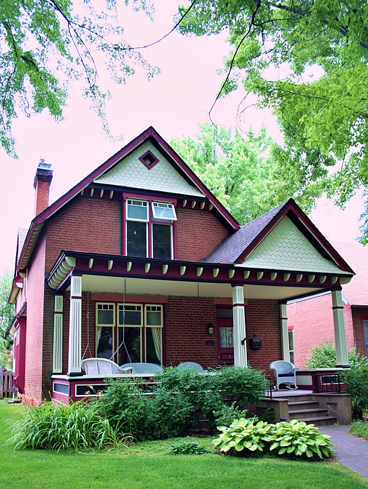 Folk Victorian home with full front porch