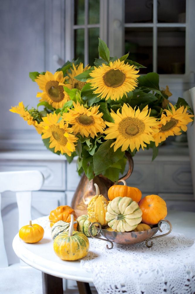 sunflower arrangement and pumpkins