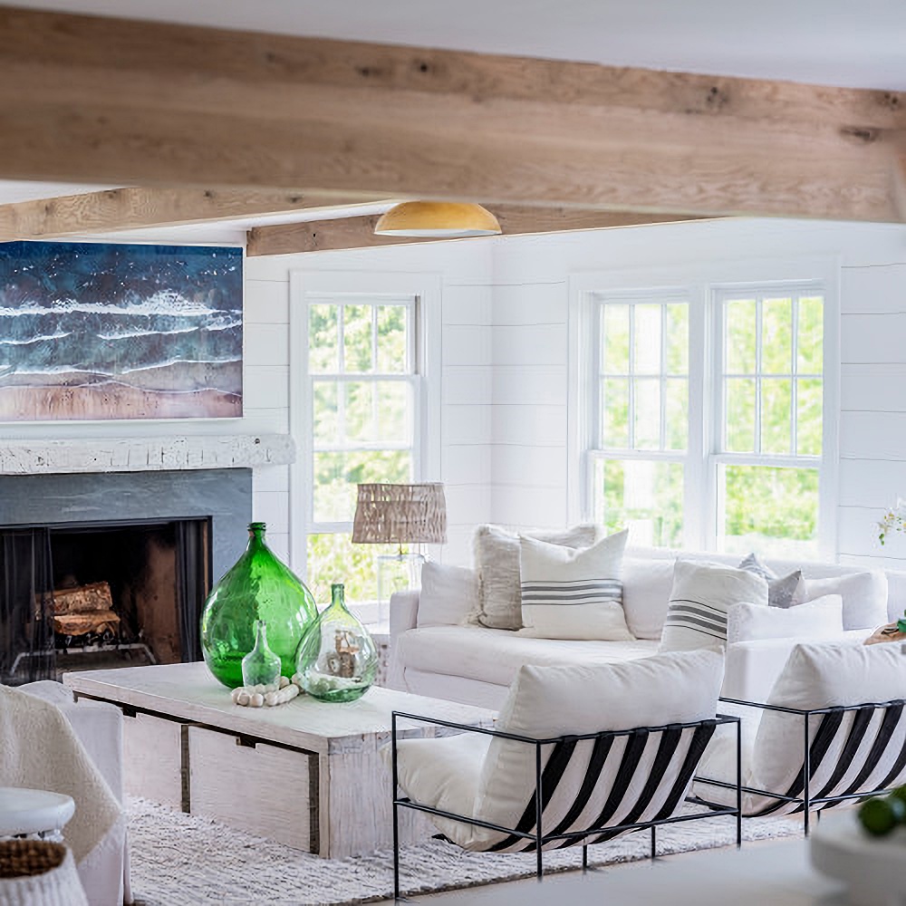 Coastal living room with white shiplap and white oak wood beams