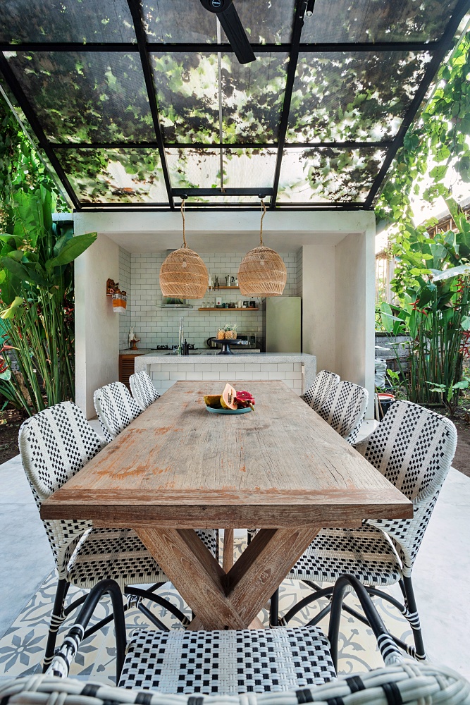 outdoor dining space with glass ceiling