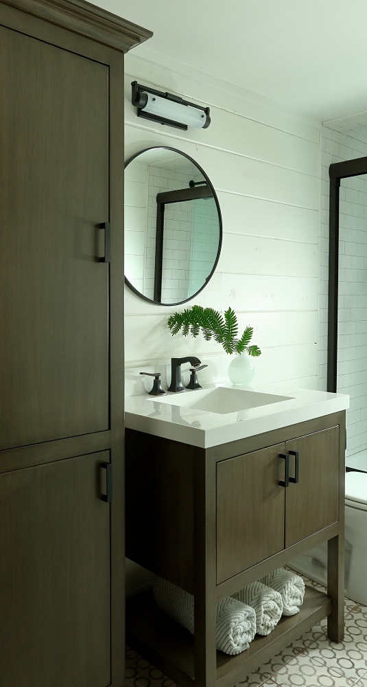 transitional style bathroom in log cabin home