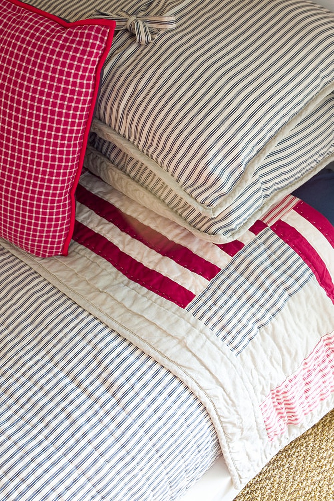 bunk bedroom with ticking stripe bedding