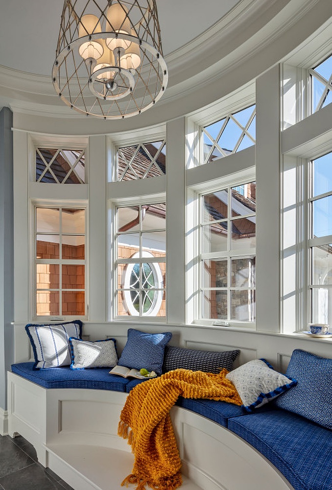 luxury waterfront home bay window with built-in seat