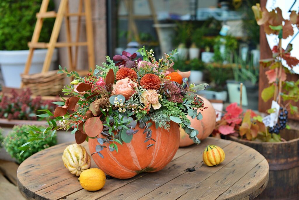 Floral arrangement of fresh flowers in a pumpkin
