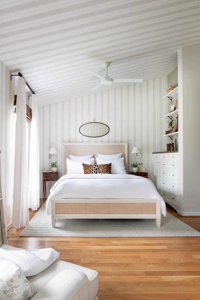 softly striped walls in a scandinavian style bedroom