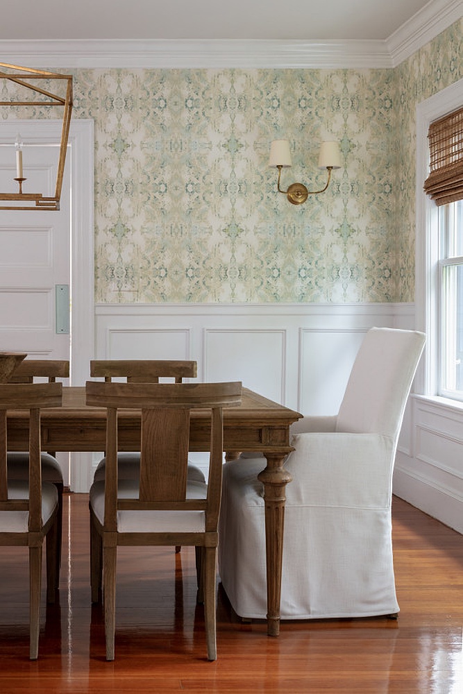 Traditional dining room with wainscoting and hardwood floors