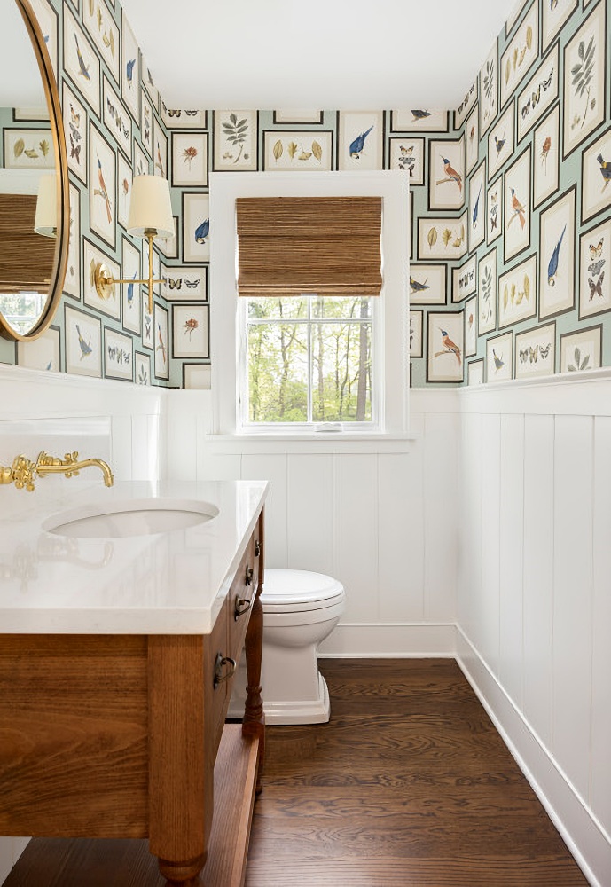 traditional powder room with nature inspired wallpaper
