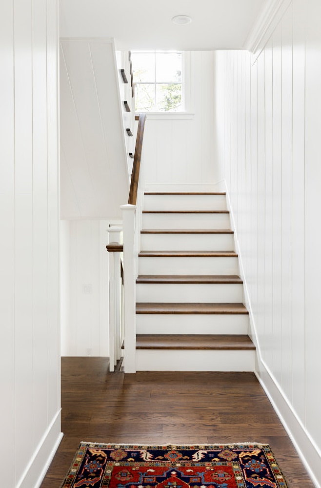 white and wood traditional staircase