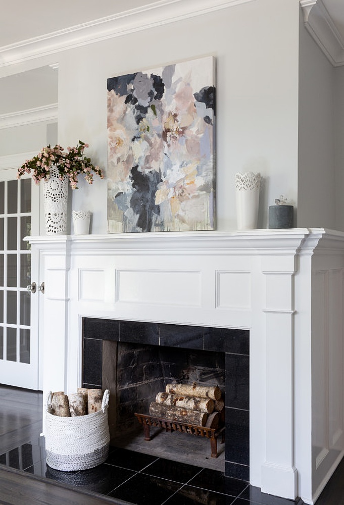 traditional white fireplace in historic transitional style home