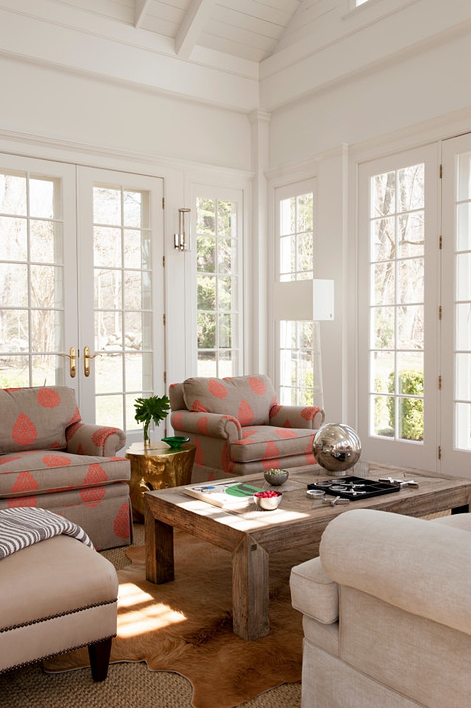 Colorful cottage living room with expansive, mullioned French doors