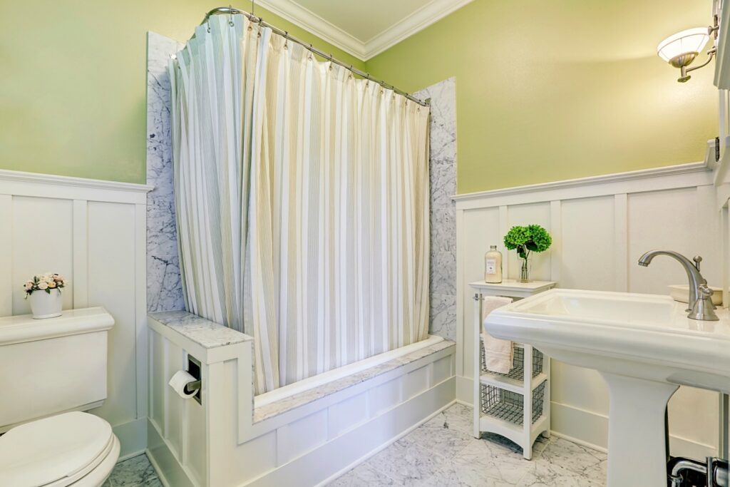 Lovely marble bathroom with full bath shower