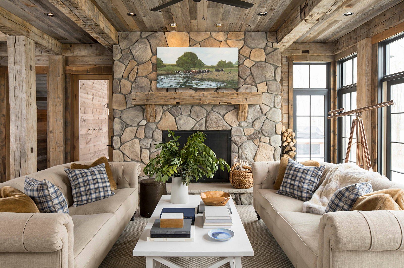 Rustic home living room with stone fireplace