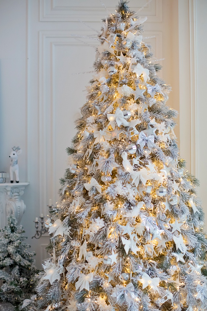 Christmas tree with white and silver decorations