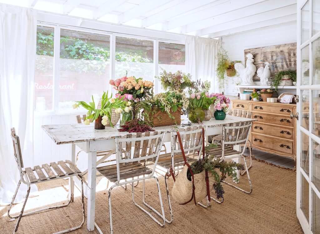 Shabby chic style dining room with garden furniture
