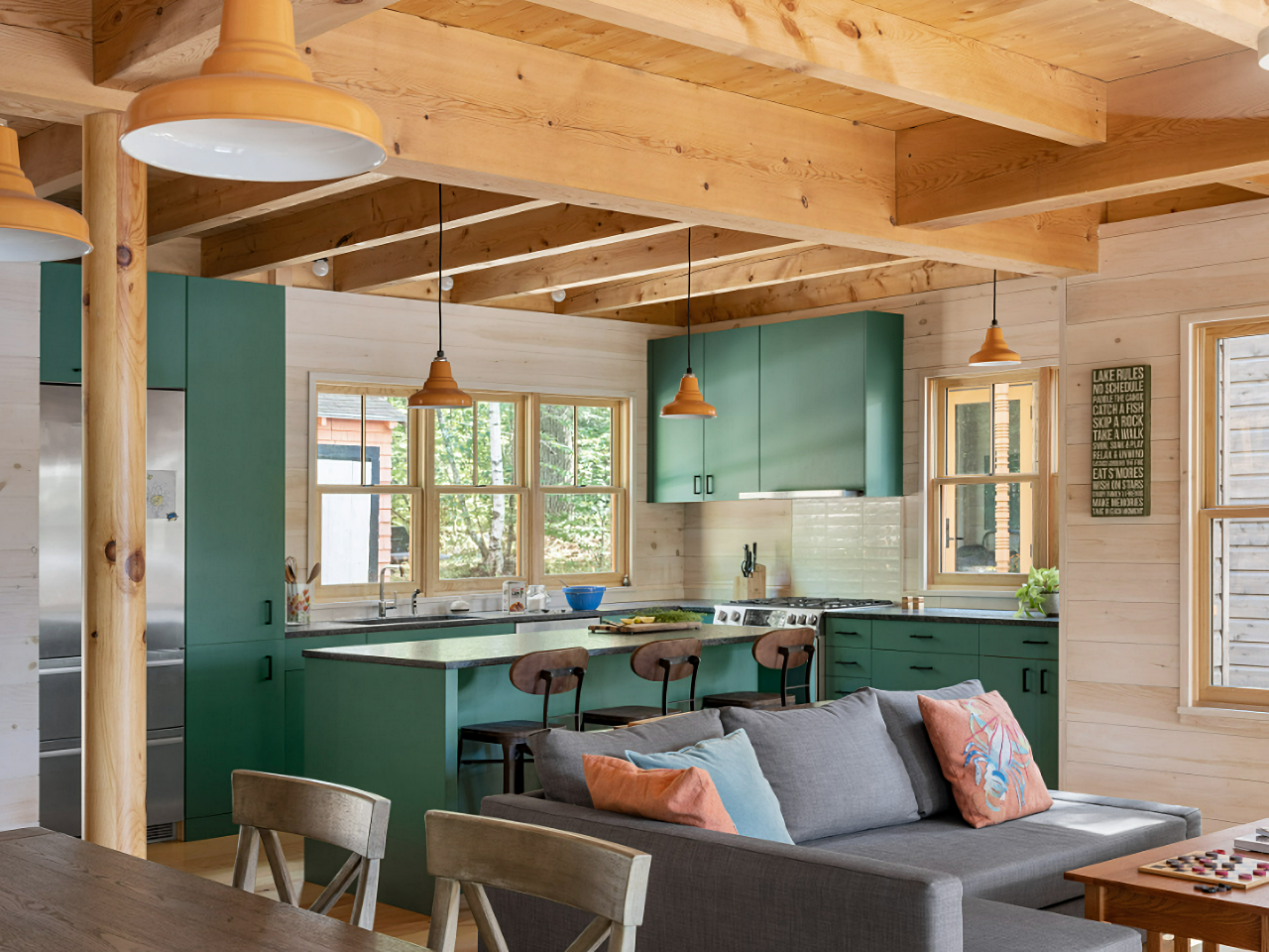 green cabinets in cabin kitchen
