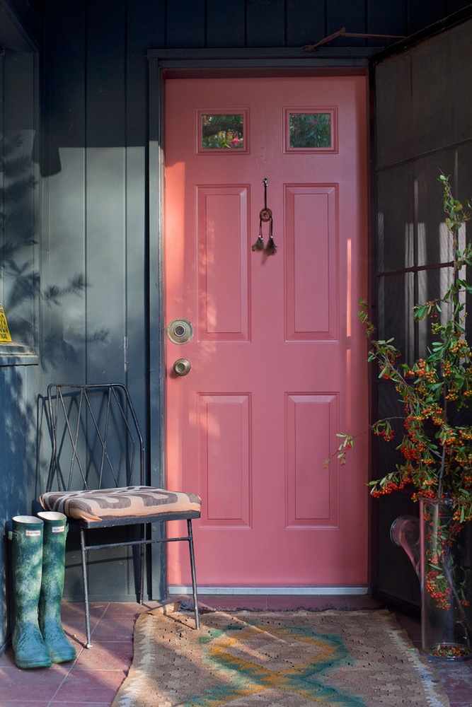 dark pink door on dark gray house