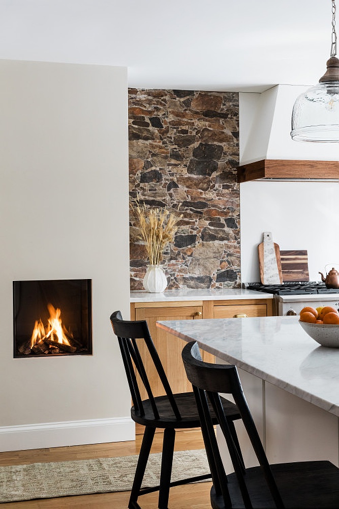 wall fireplace in custom kitchen
