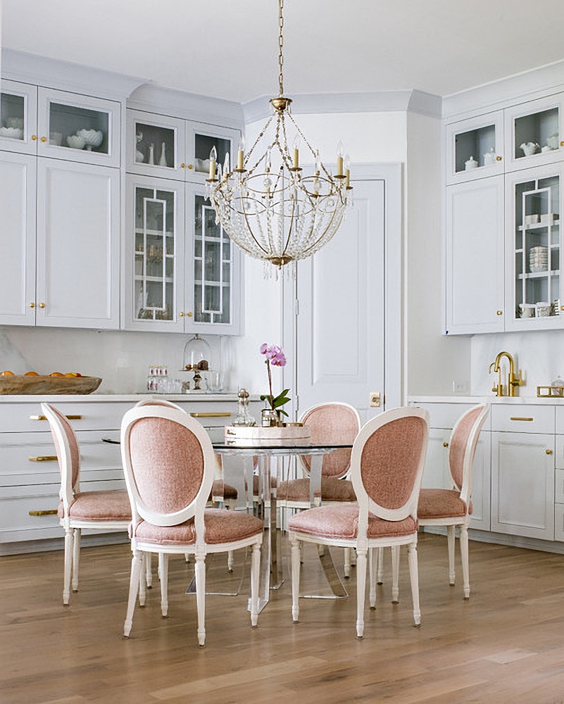 pink dining chairs in white kitchen