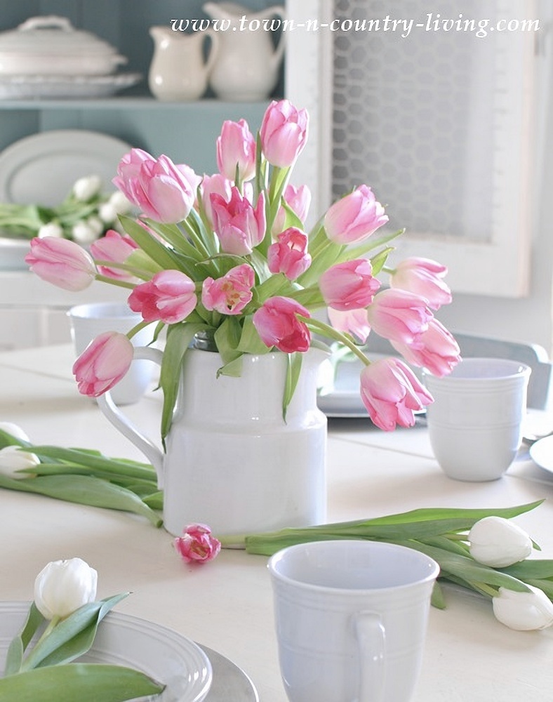 pink tulips in white ironstone pitcher