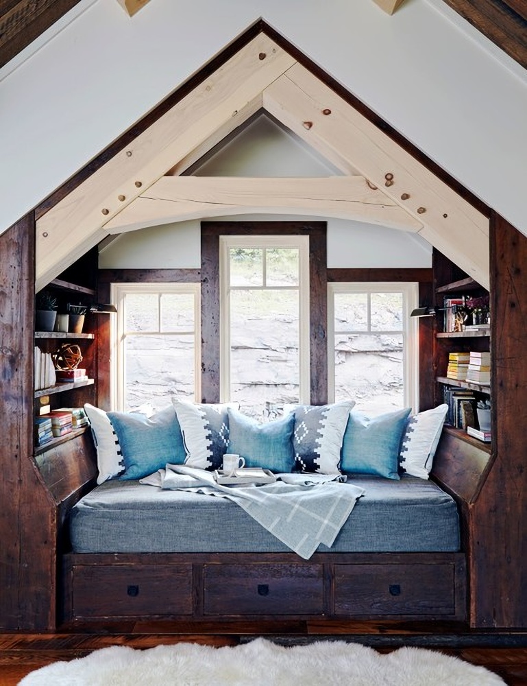 cozy built-in reading nook in ski home