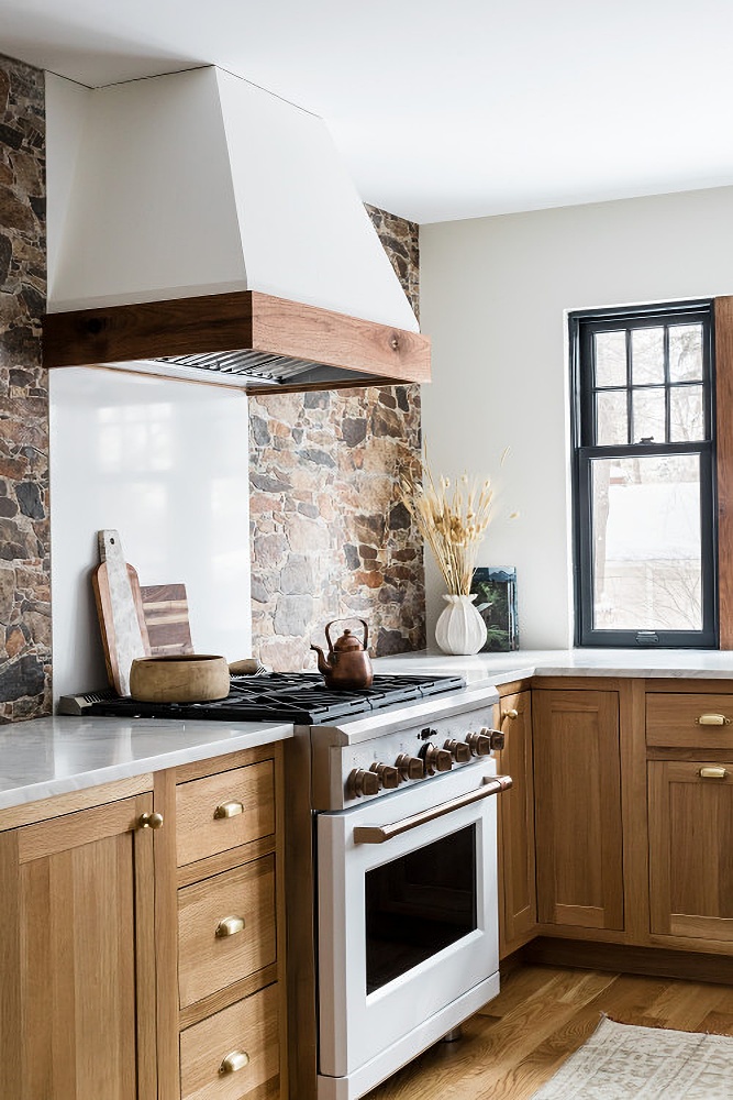 rustic stone wall in a high-end kitchen