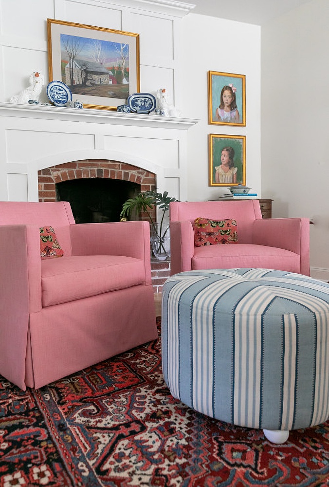 pink chairs in traditional family room