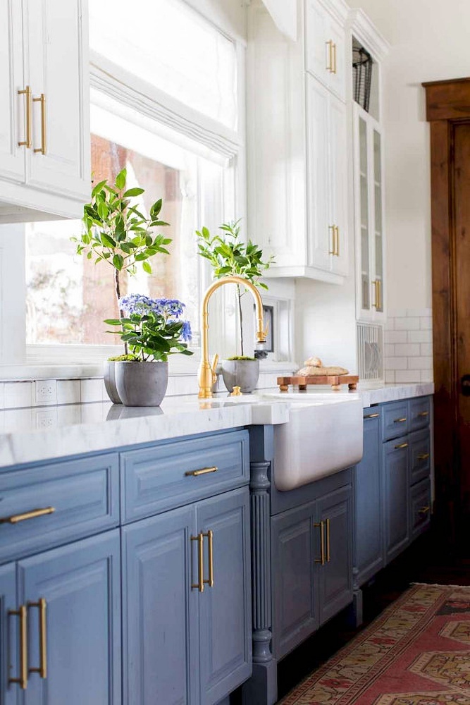 traditional country kitchen with blue cabinets