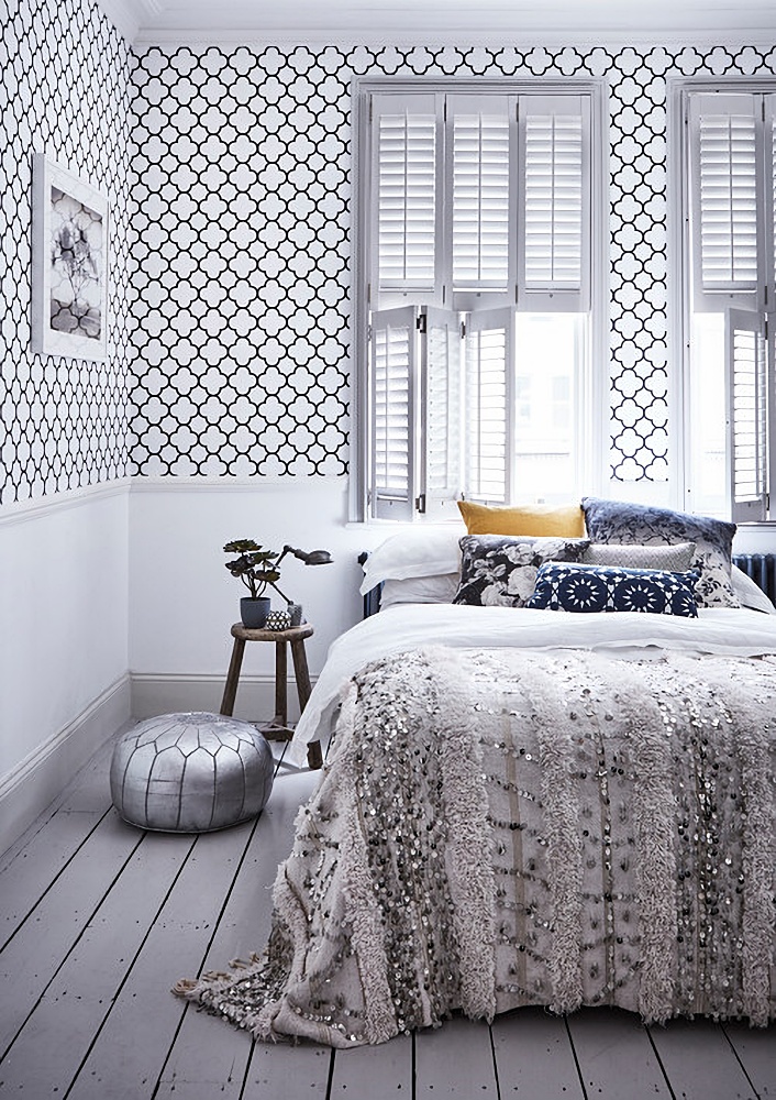 Scandinavian style bedroom with pretty wallpaper