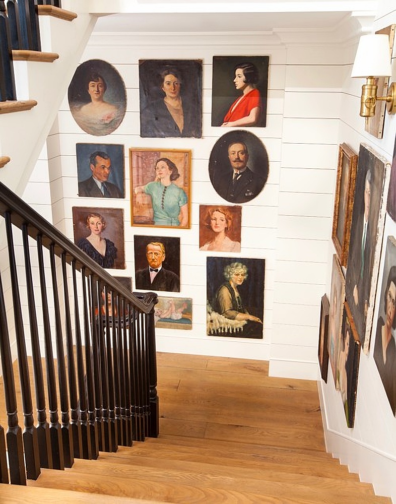 gallery wall of vintage oil portraits