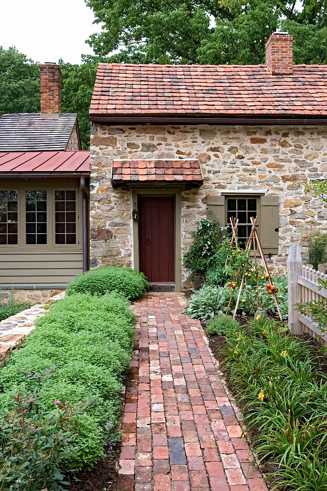 Historic stone and clapboard house in earth tones