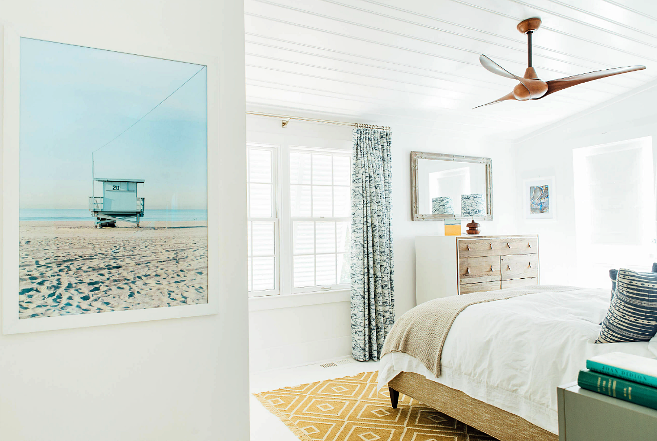 light and airy master bedroom in beach bungalow