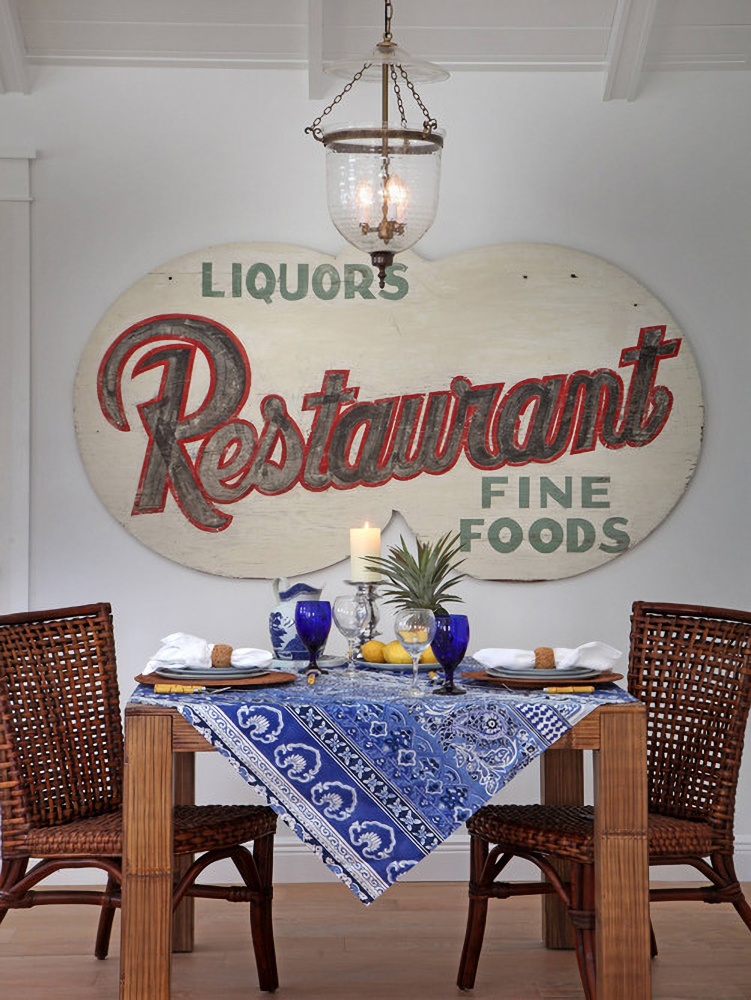 Vintage metal restaurant sign in dining room