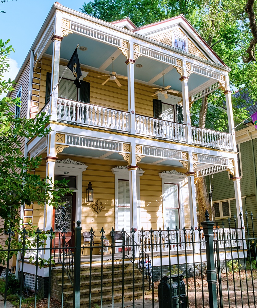 Yellow house with two-story porch