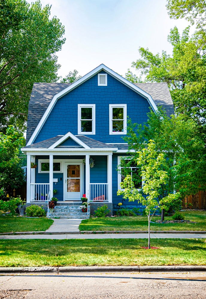 Blue Victorian House with Small Front Porch