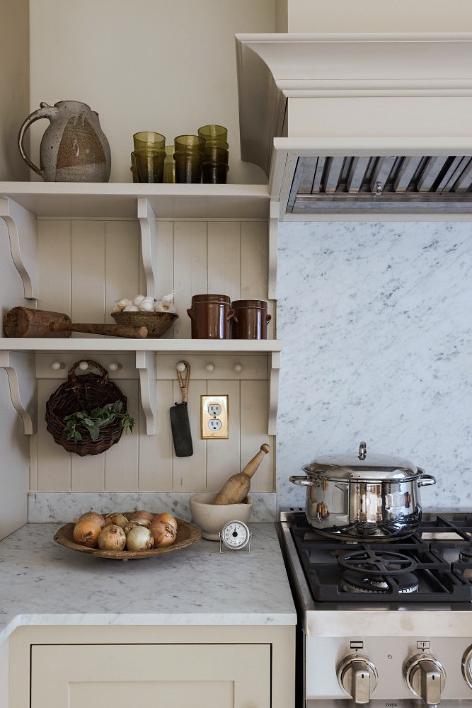 open shelves with Shaker pegs in country kitchen