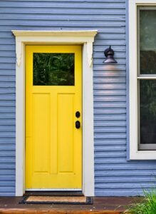 Embrace Sunshine Vibes With A Vibrant Yellow Front Door