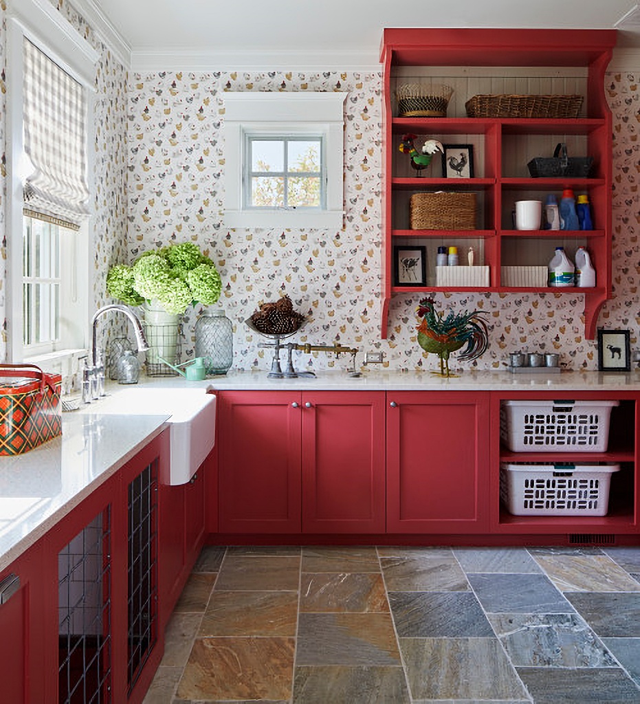 red and white laundry room with stone tile floor
