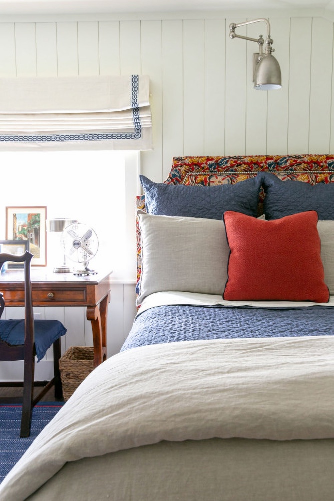 red, white, and blue cottage bedroom