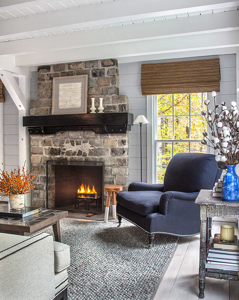 farmhouse family room with stone fireplace