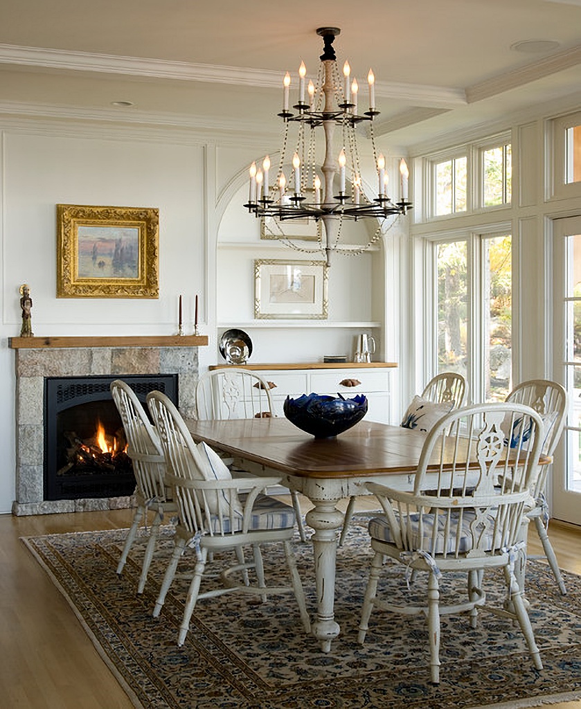 Traditional farmhouse style dining room with elegant chandelier