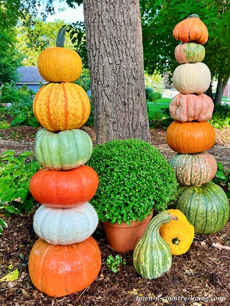 how to create a whimsical outdoor pumpkin tower