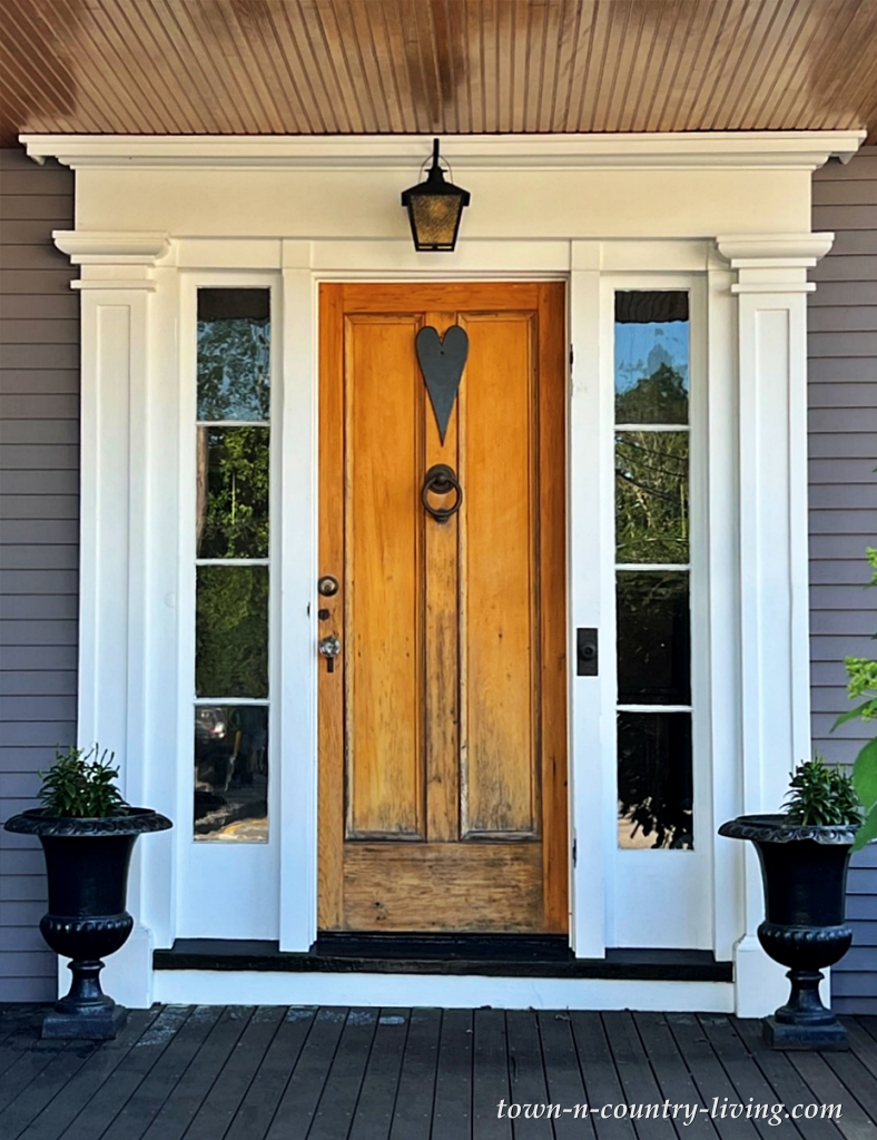 vintage front doors - wooden door with metal heart