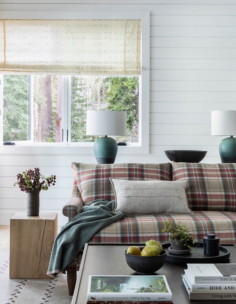 brown plaid sofa in white living room